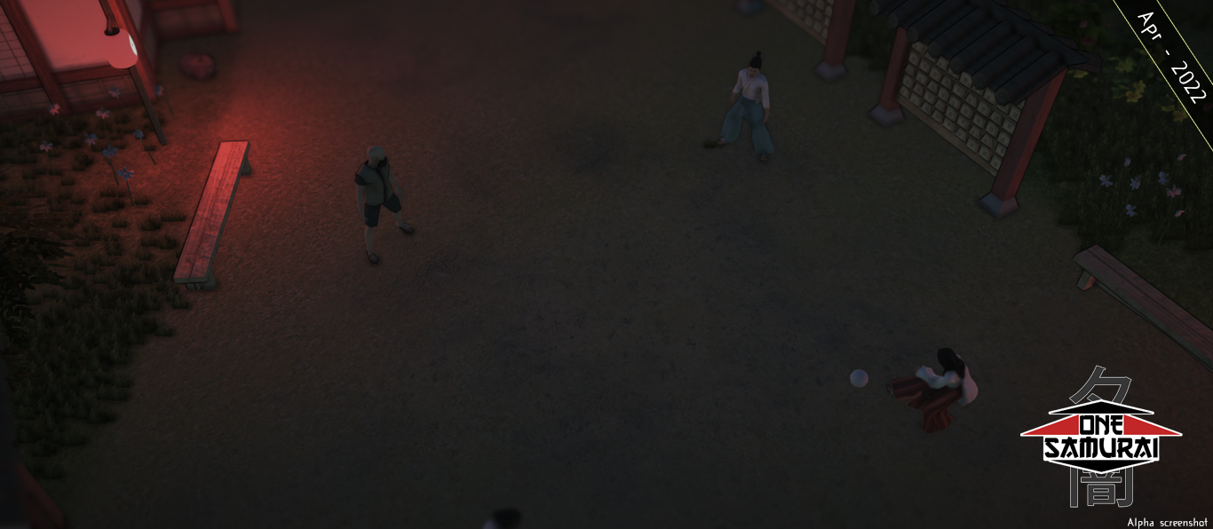 Four people kicking a ball around